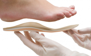 What is the impact of shoe insoles on health?
