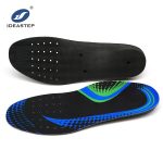 Punching holes in shoe insoles